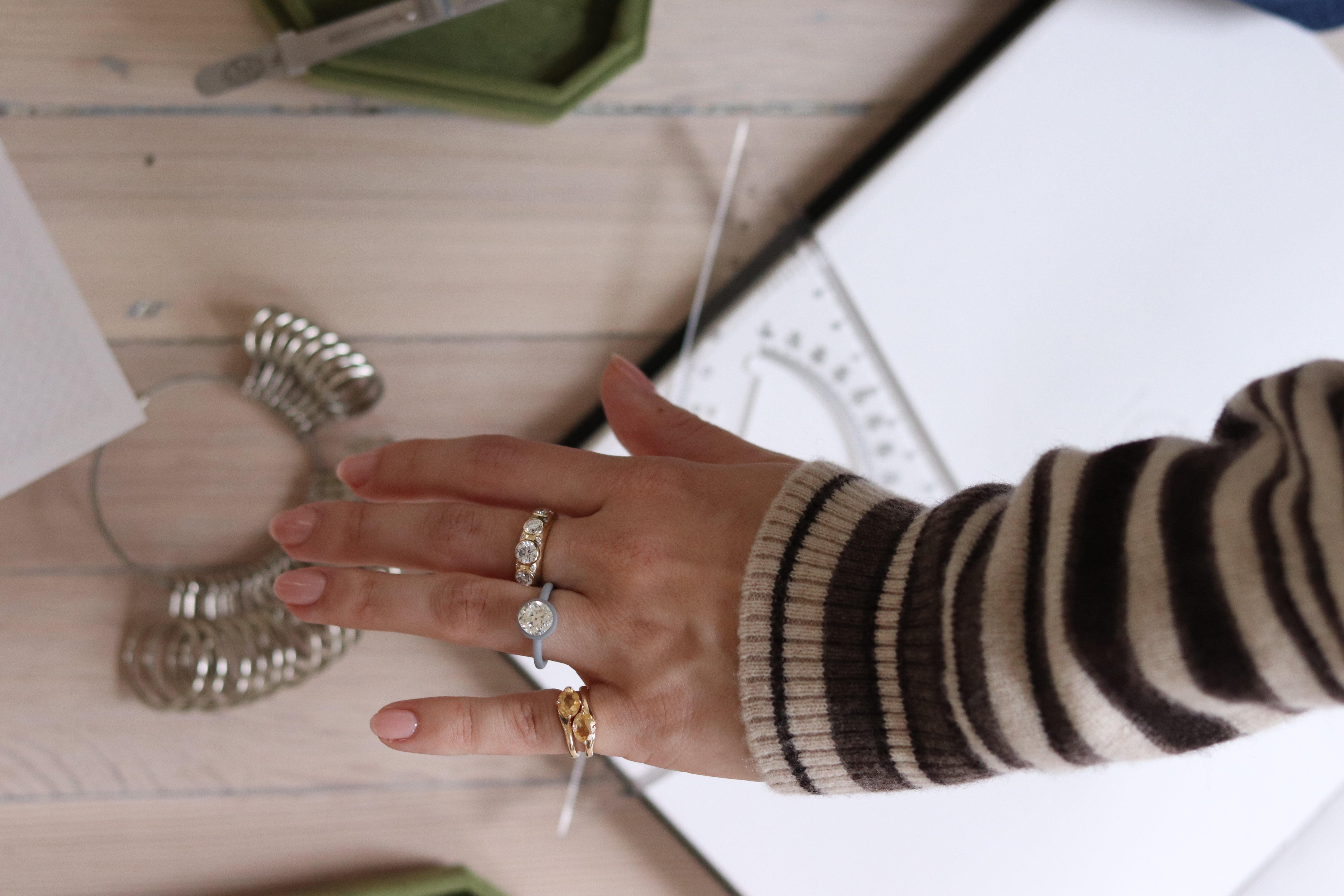 Step Five - Once everyone is happy with the design and it has been fully approved, Kiersten will source any additional gemstones needed to complete the piece. This entire process is managed remotely from Washington, DC, with the final piece being crafted by hand by our expert jewelers in New York City.Each stage is completed with meticulous attention to detail - from casting the metal, to carefully setting each gemstone, to polishing the finished piece to perfection. Nothing is mass-produced, and every ston